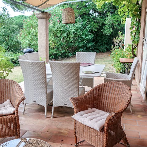 Sip wine in the shade of the covered terrace