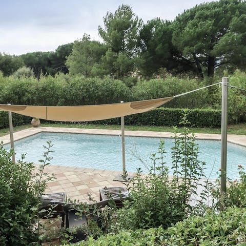 Swim a few laps in the home's private pool