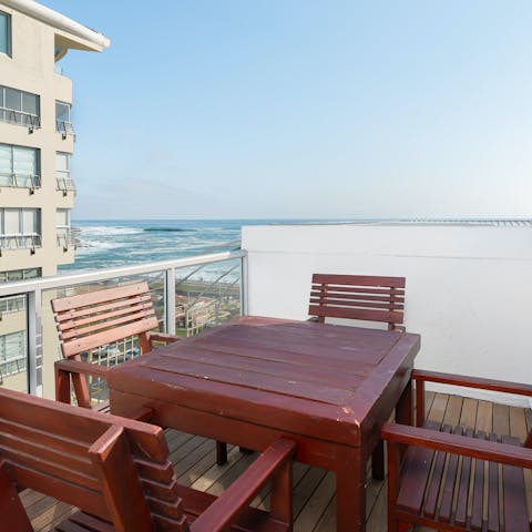Enjoy a sunny alfresco meal on the secondary balcony