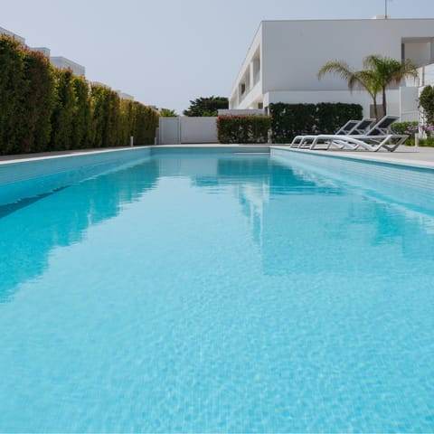 Go for a splash in the large communal swimming pool