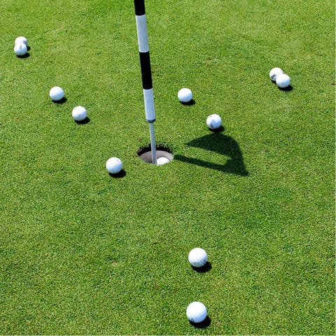 Play a few rounds of golf at one of the nearby clubs