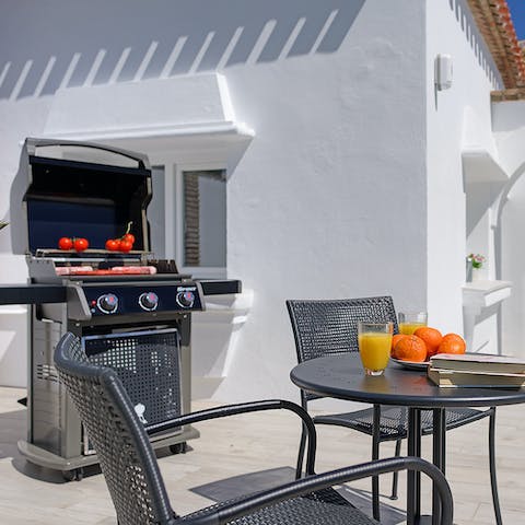 Fire up the gas grill for a barbecue and drinks as the sun sets