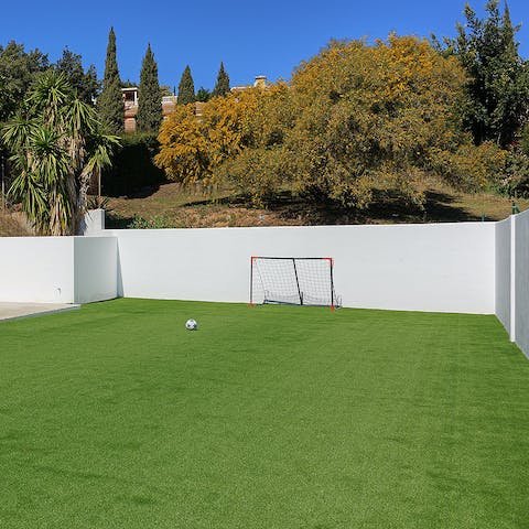 Enjoy a group kick-about or play some basketball