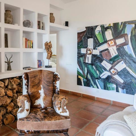Admire the collection of modern and traditional art dotted throughout the house