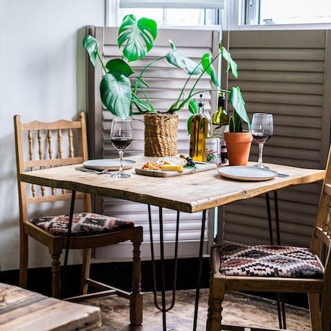 Have elegant drinks at the sleek dining table