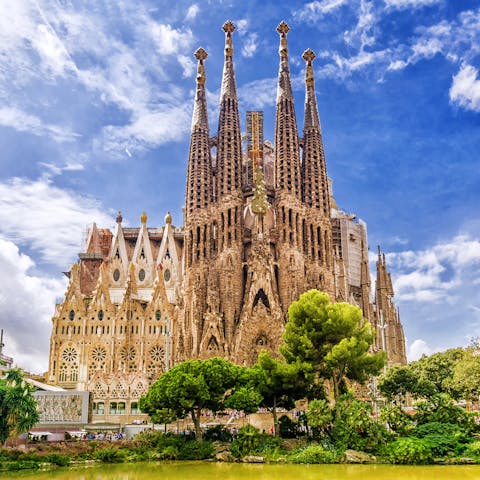 Marvel at La Sagrada Familia's magnificent Gaudi architecture, a ten-minute walk away