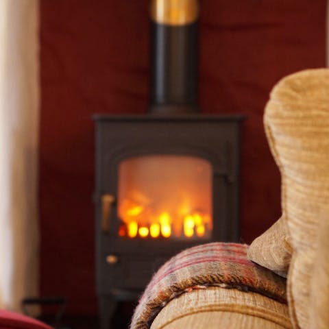 Curl up by the wood-burning fire