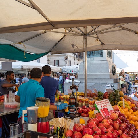 Shop for fresh produce at the market in Campo de' Fiori, two minutes away