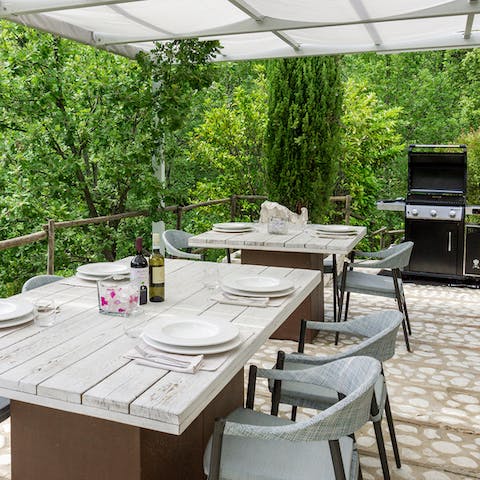 Dine on the terrace surrounded by greenery