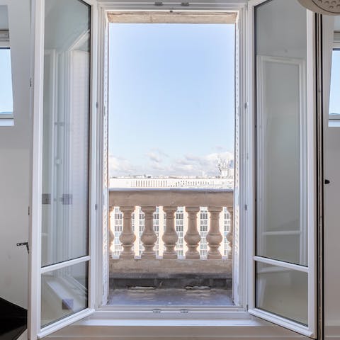 Pad out to the balcony and admire the city views