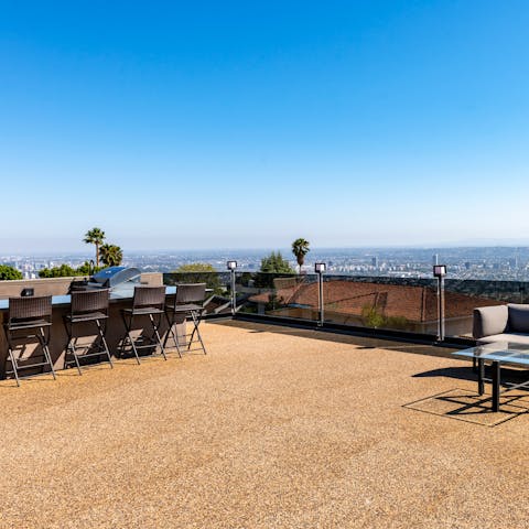 Barbecue on the huge roof terrace with city views