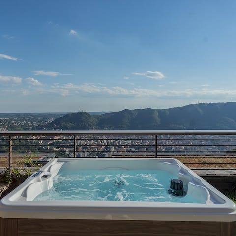 Watch the sky transform whilst soaking in the luxurious jacuzzi