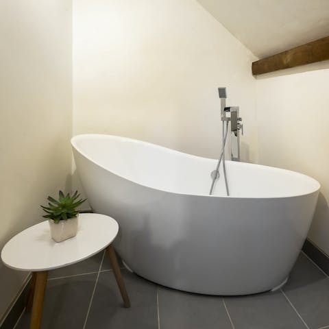 Sink into the soaker tub after a long day exploring the Lake District