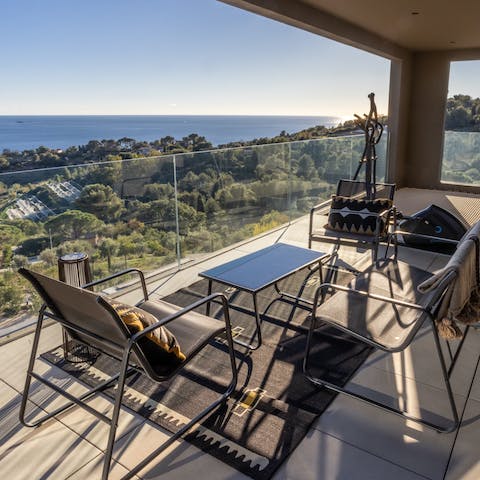 Appreciate the views with a crisp glass of local French wine in hand