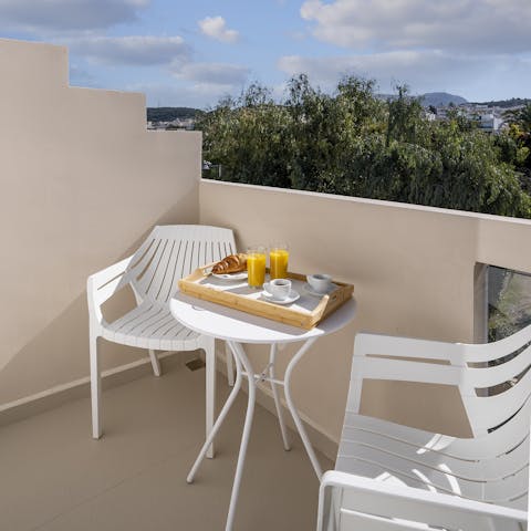 Start your day with a continental breakfast out on the balcony