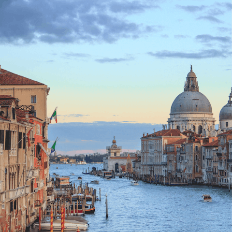 Float along the iconic canals of Venice
