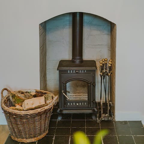 Light a fire in the wood-burner and warm the whole house