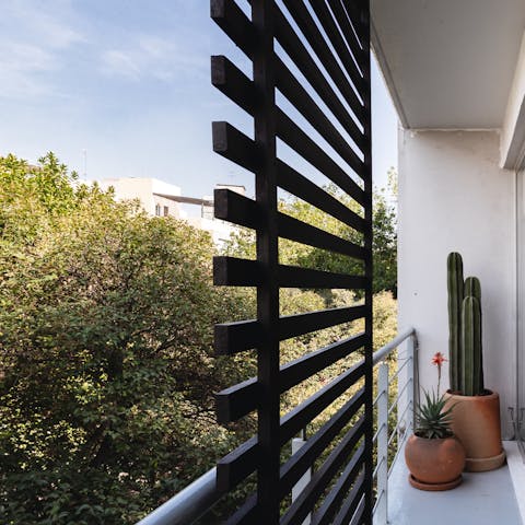 Enjoy leafy views from your private balcony