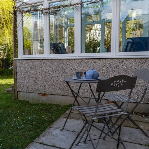 Take tea in the garden and enjoy the fresh air and lush greenery
