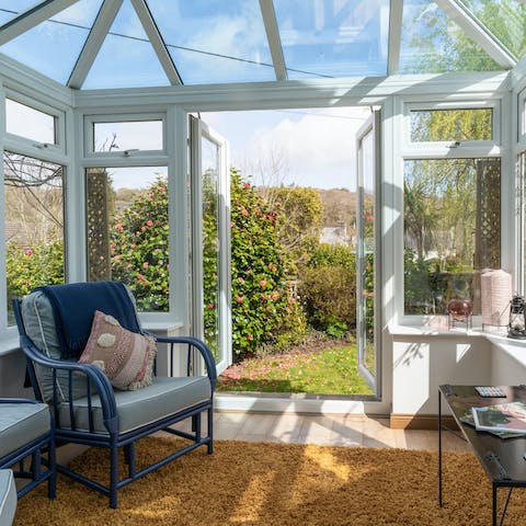 Relax in the conservatory and enjoy your morning coffee or an afternoon nap in the sunny room