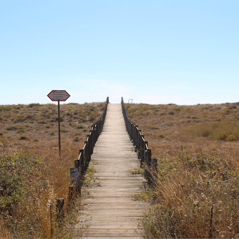 Embrace the refreshing spirit of the sea from Moledo beach – a short drive away