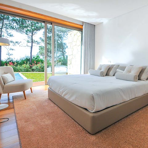 Enjoy the views across the garden whilst lounging in the bedroom