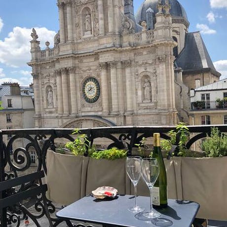 Enjoy a beautiful view of Église St. Paul from the balcony