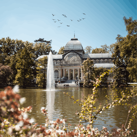 Take in the sights at El Retiro Park, a fifteen-minute walk away