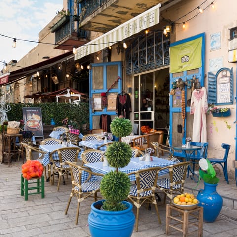 Wander for twenty-minutes to Old Jaffa and check out the flea market and quaint cafes