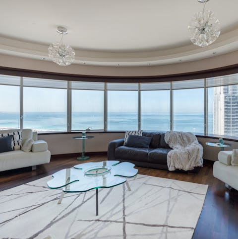 Enjoy uninterrupted views of the Persian Gulf from the living area