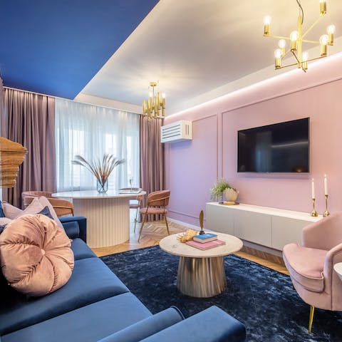 Gather for a movie night in the colourful and quirky living room