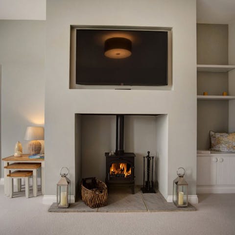 Cosy up in front of the log burner after a brisk coastal walk