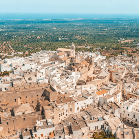 Explore Ostuni, just a five-minute drive away