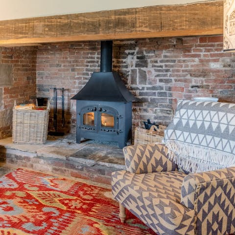 Grab a good book and get cosy by one of the home's fires 