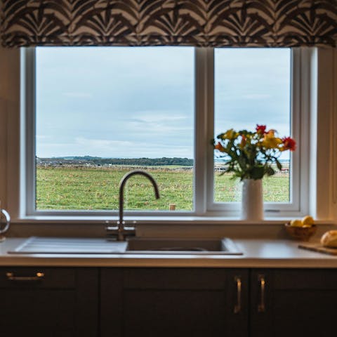 Enjoy lovely rural views from this home just outside of Wick