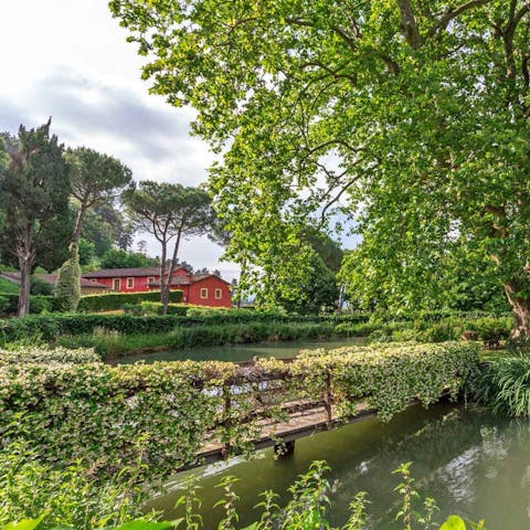 Stroll around your private lake, complete with swans
