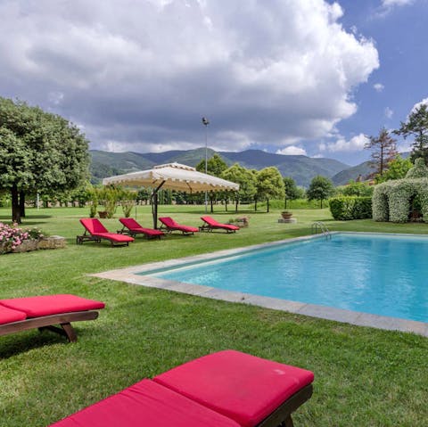 Have a snooze under the Tuscan sun beside your open-air pool
