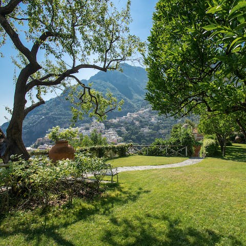 Enjoy a peaceful moment in the villa's secluded gardens