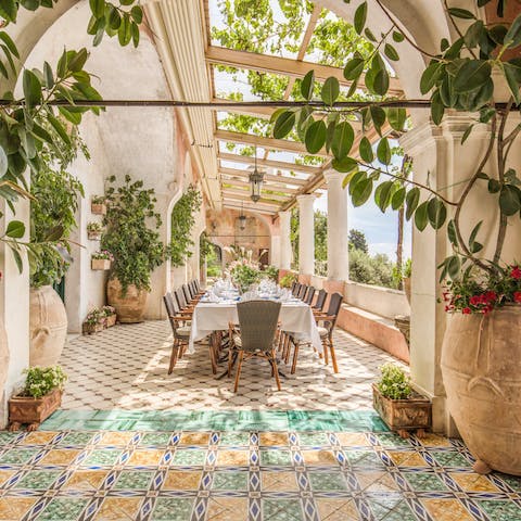 Dine al fresco on the villa's main terrace – think fresh pasta and plenty of limoncello