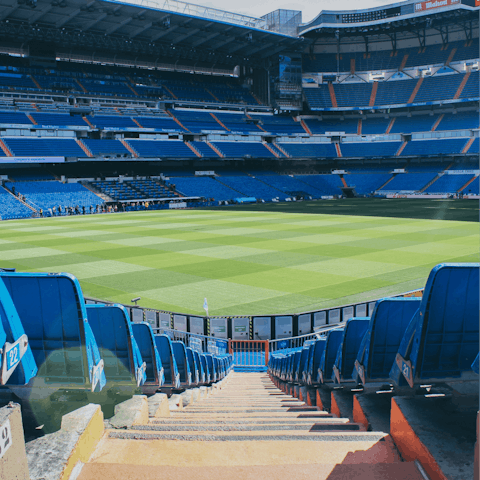 Watch football at the Santiago Bernabéu Stadium, five minutes away