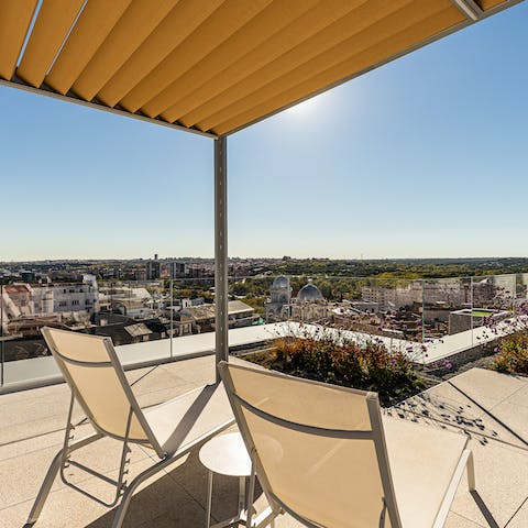 Soak up stunning city views over the Madrid rooftops from the communal terrace