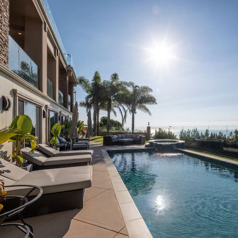 When the day heats up dip into the pool tucked away under palm trees