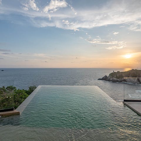 Watch the stunning sunset from the infinity pool