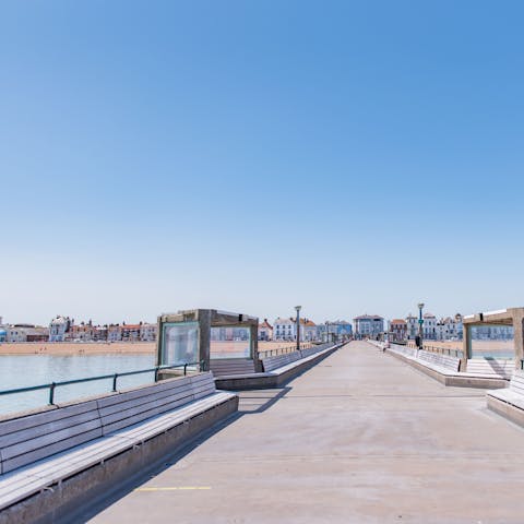 Stroll the coastal promenade from your home into Deal with its iconic pier