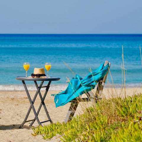 Soak up the sun on Almyros beach – it's just a few steps away