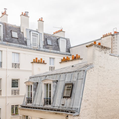 Take in the views over the Parisian rooftops