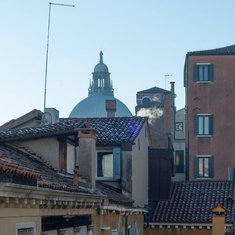 See the mighty dome of Basilica di Santa Maria della Salute from your window