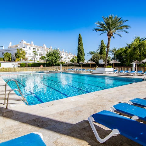 Cool off from the hot Spanish sun with a dip in the shared outdoor pool