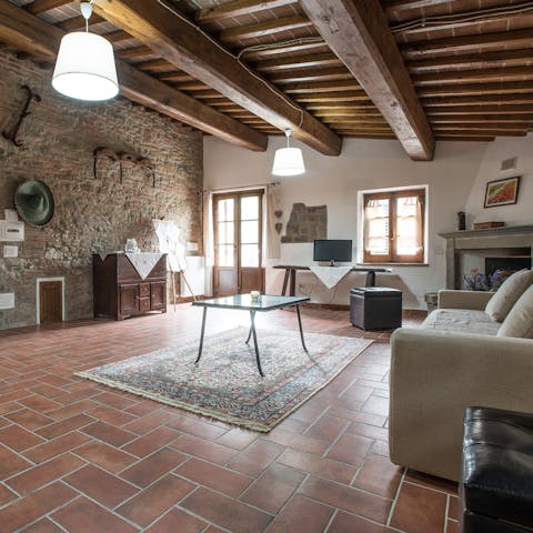 Appreciate the old-world charm of this sympathetically restored Tuscan farmhouse