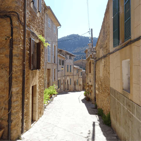 Stay in the heart of Artà and visit its Tuesday market for pretty pottery